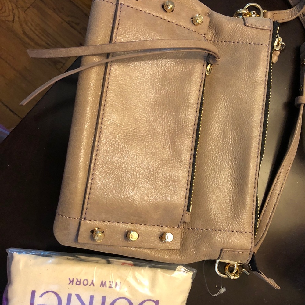 Brand new cross body leather purse